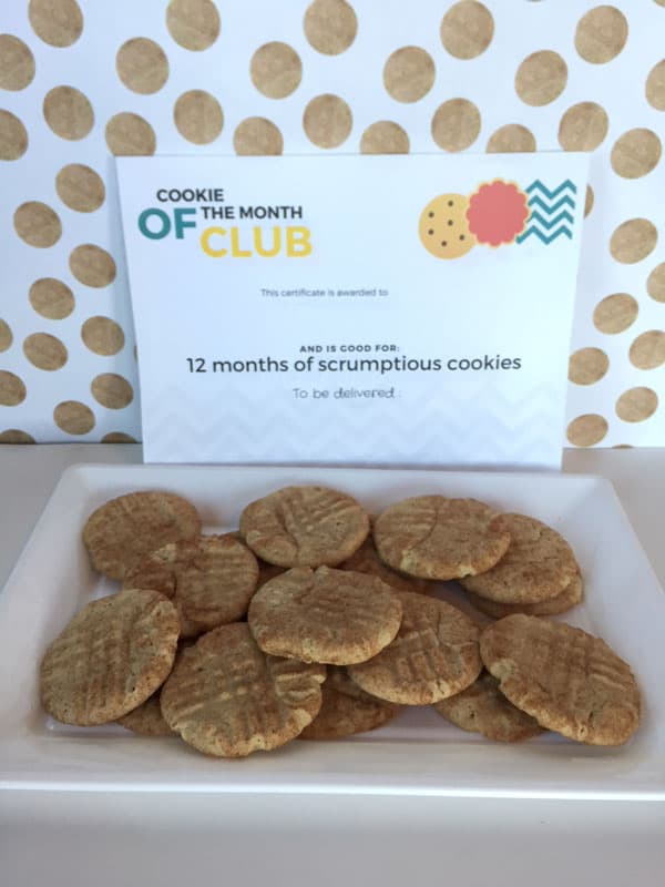 A platter of homemade cookies in front of a certificate that says Cookie of the Month Club Gifts for Older Men