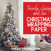 A photograph of a white flocked Christmas tree all decorated with wrapped gifts underneath. Text overlay says Trendy Classy and fun Christmas wrapping Paper the gifty girl dot com