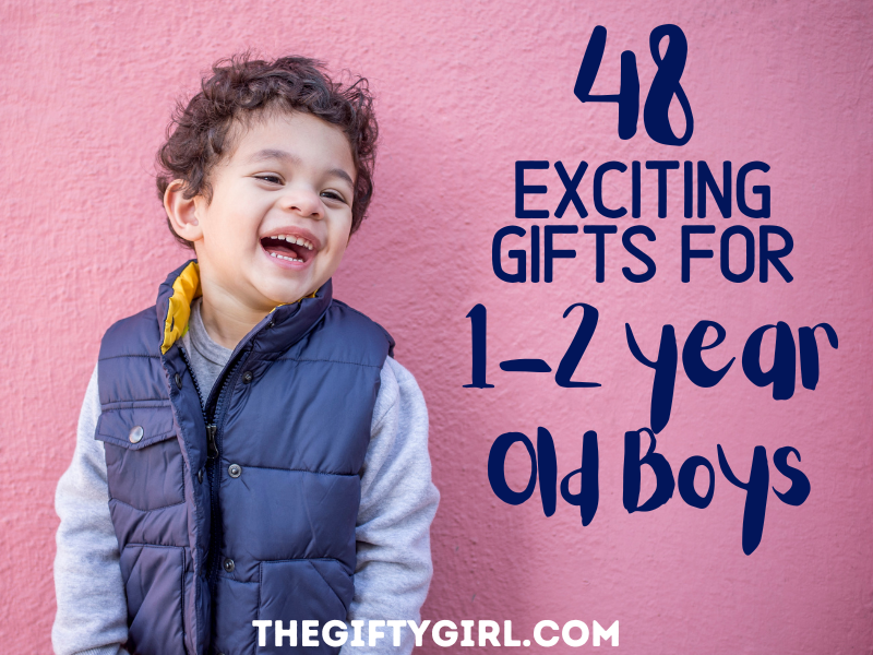 a young curly haired boy is laughing while looking to the side. He is wearing a blue vest. Text overlay says 48 exciting gifts for 1-2 year old boys
